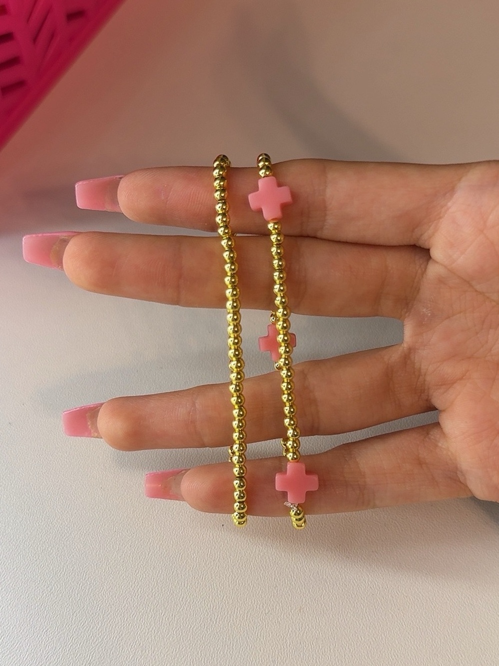 Gold Beaded Bracelet with Pink Cross Beads